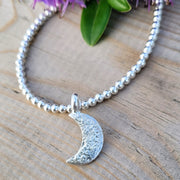Crescent Moon Ashes Into Silver Beaded Bracelet